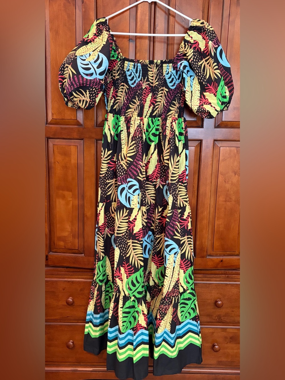 Tropical Print Smocked Maxi Dress in Black with Bright Leaf Motif
